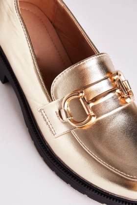 Loafers with gold store bar