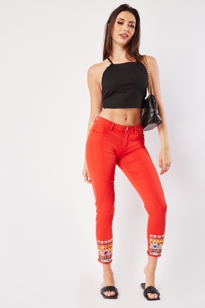 Image of Red Embroidered Hem Jeans