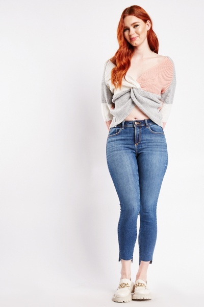 Image of Raw Uneven Hem Skinny Jeans