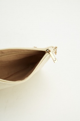 small beige clutch bag