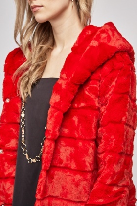 red hooded fur coat