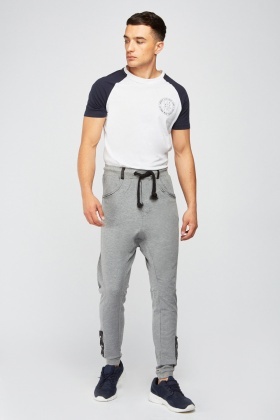 jogging pants with buttons on the side