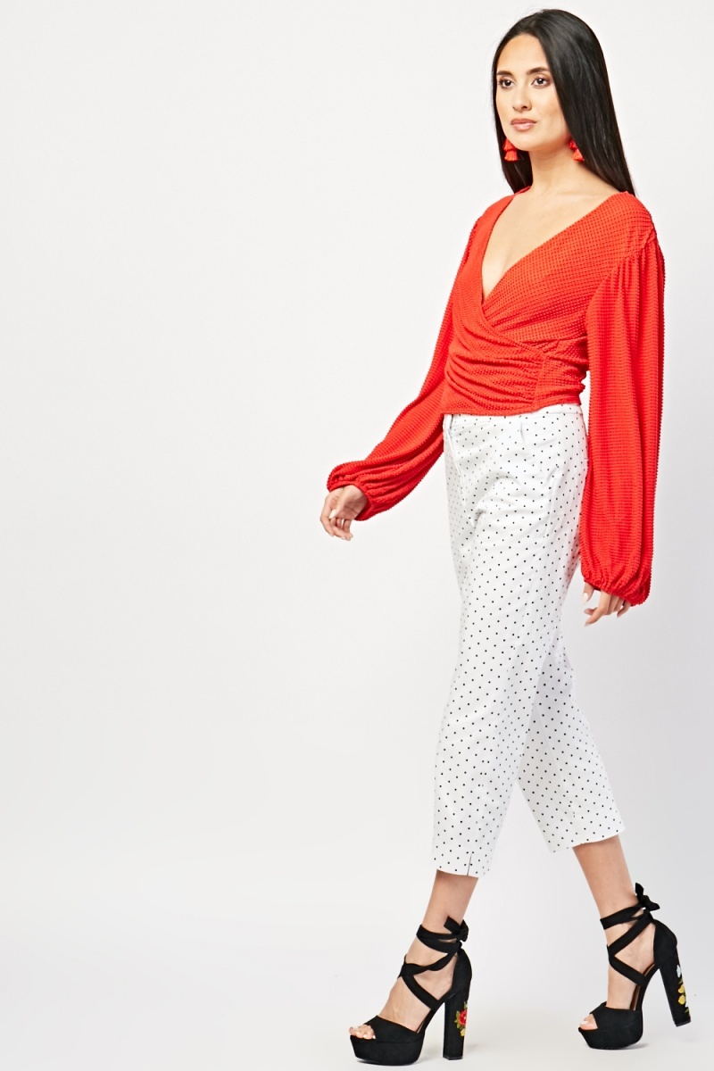 white polka dot trousers