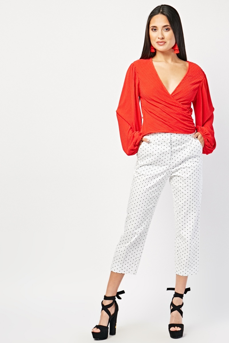 white polka dot trousers