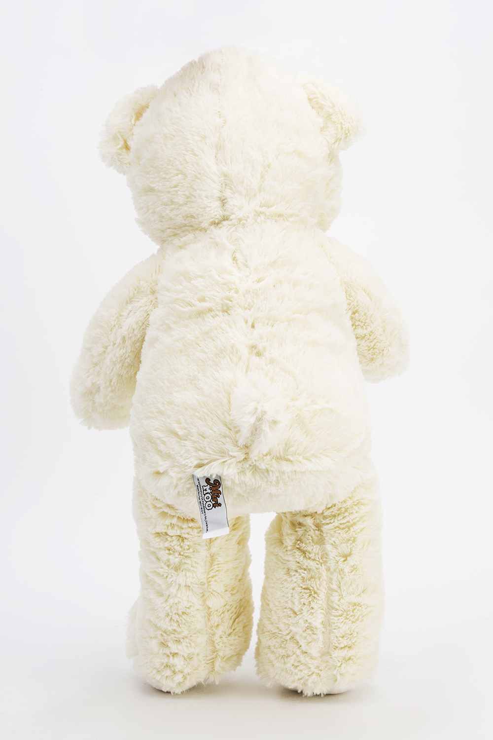 white and yellow teddy bear