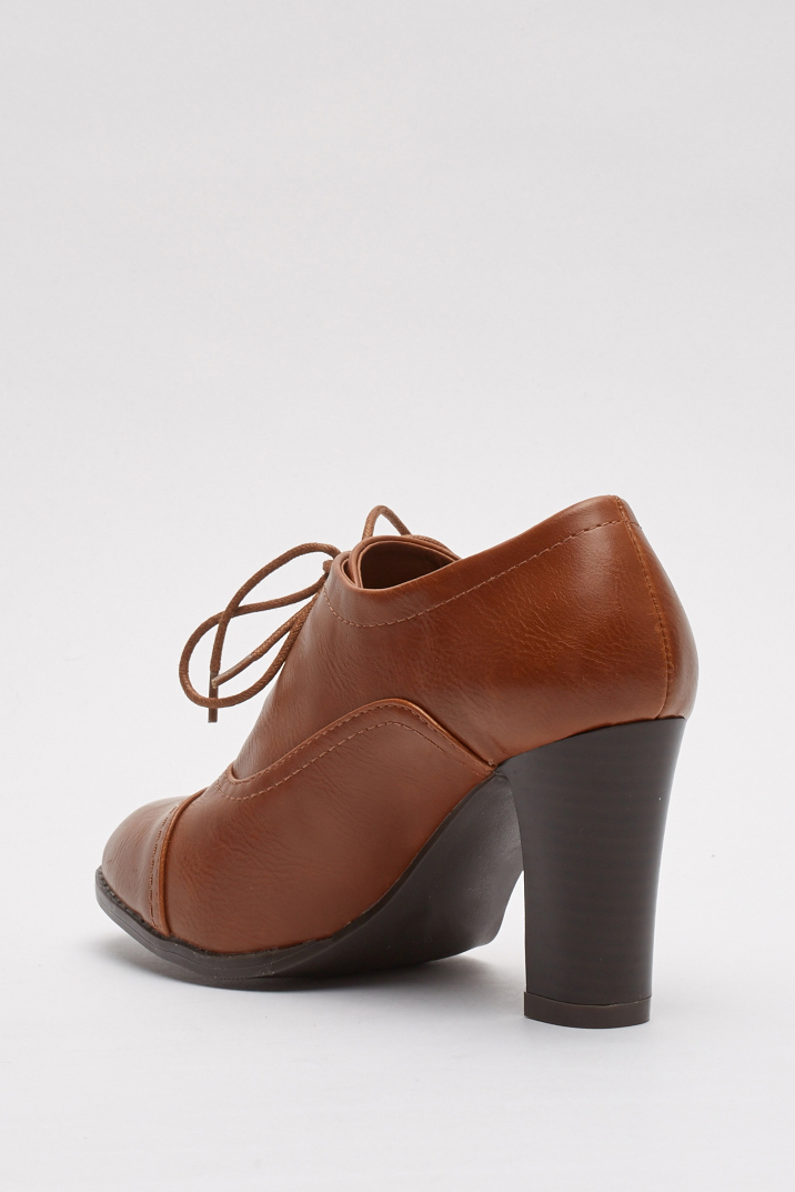 leather heeled brogues