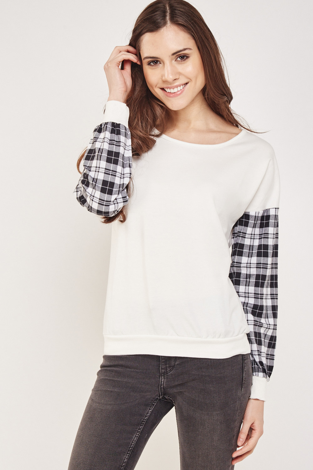 gray shirt with plaid sleeves