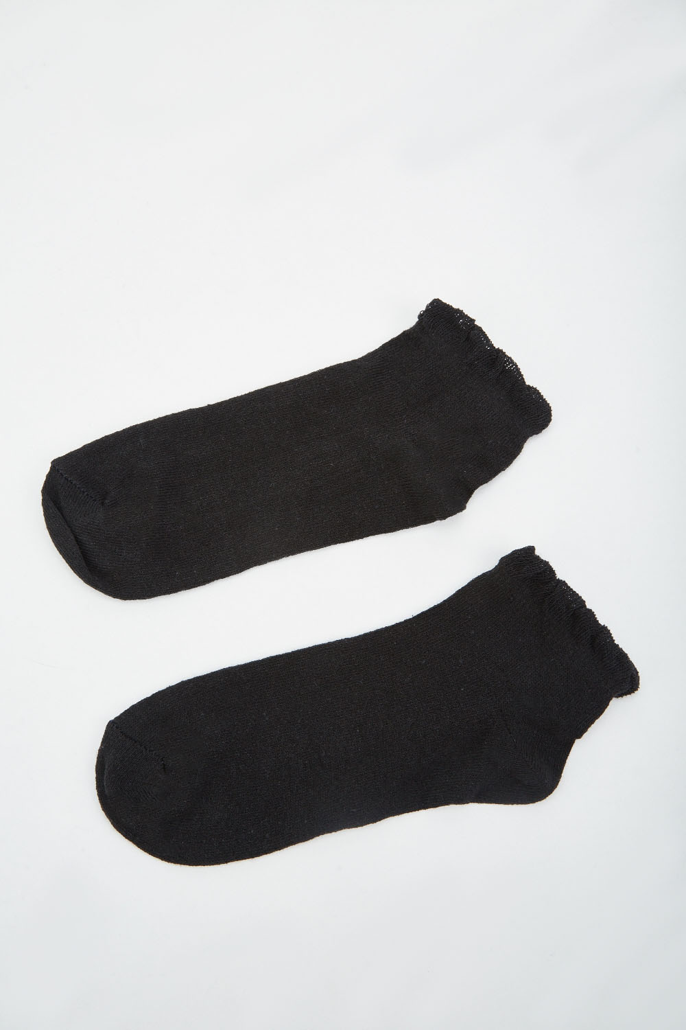 12 Pairs Of Plain Black Socks - Just $6