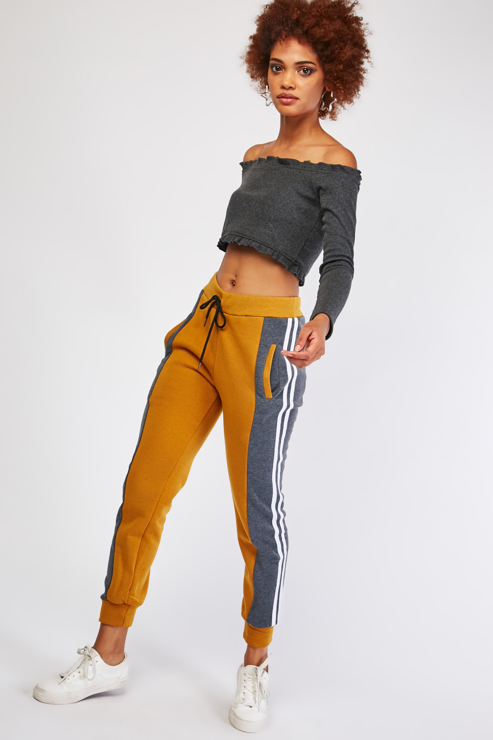 black joggers with yellow stripe